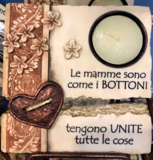 candela da appoggio scolpita su pietra